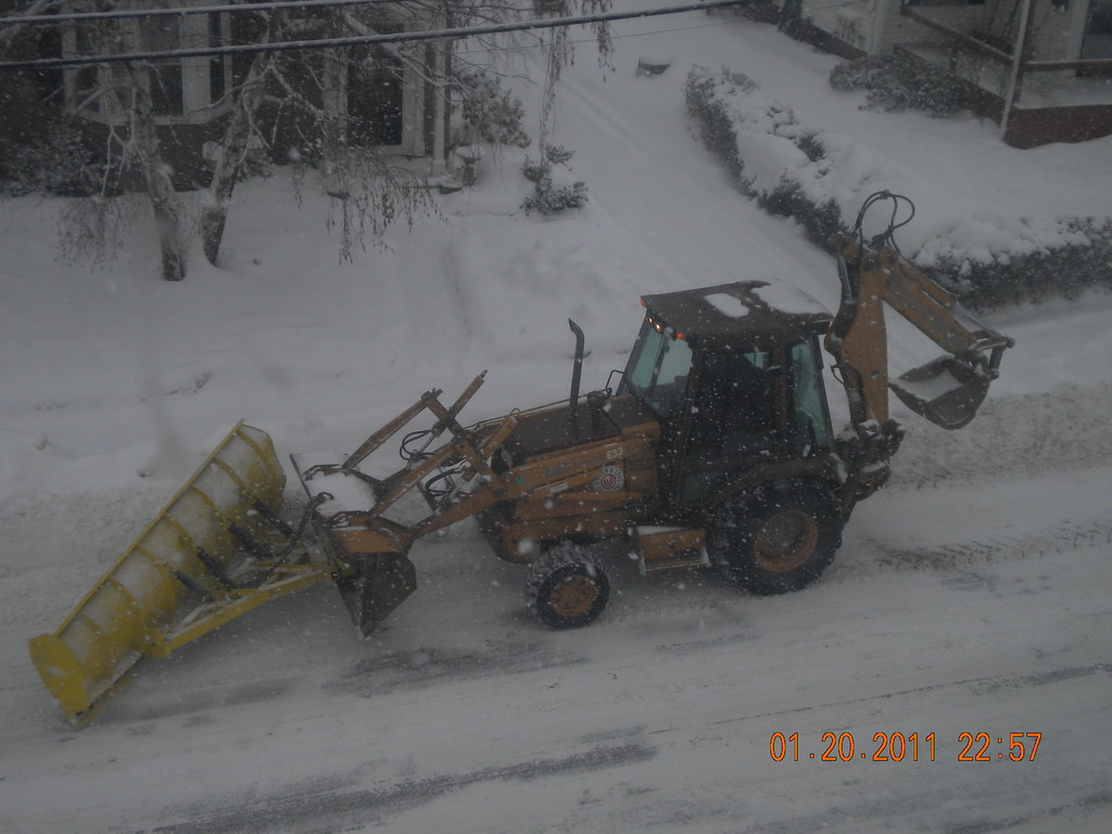 Snow Plow Case Backhoe plowing snow. matredsoxfan Flickr