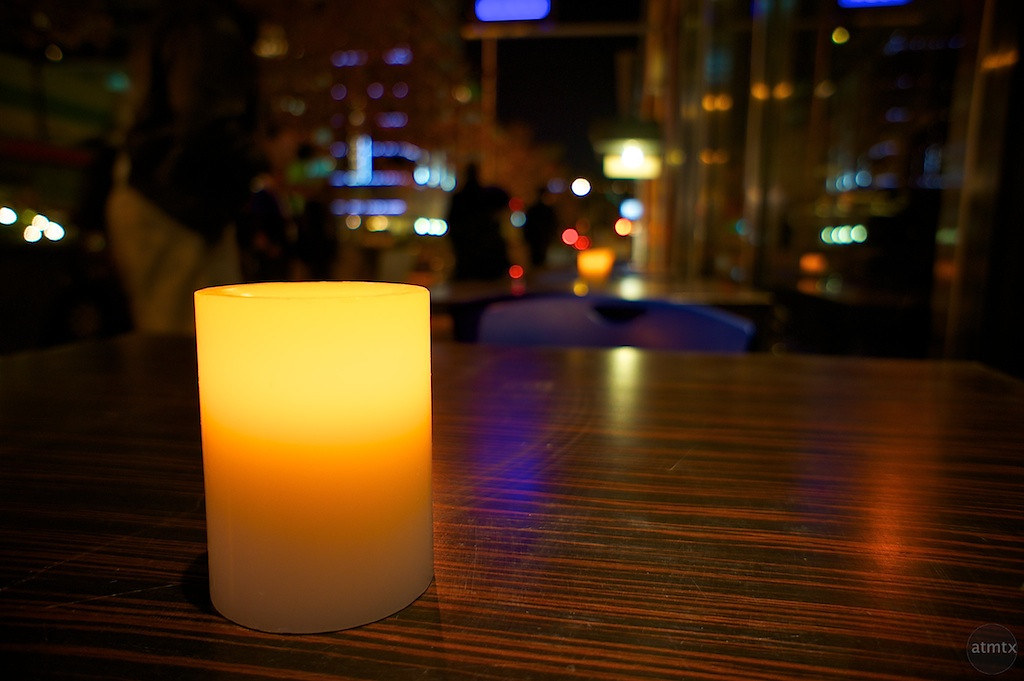 Candle with Bokeh Downtown, Austin, TX A candle on a outdo… Flickr