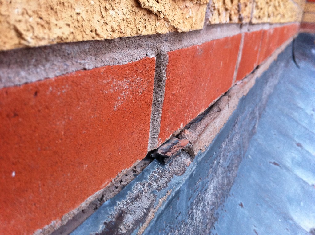 Mortar faling away from lead flashing Prof Stephen Scaysbrook Flickr