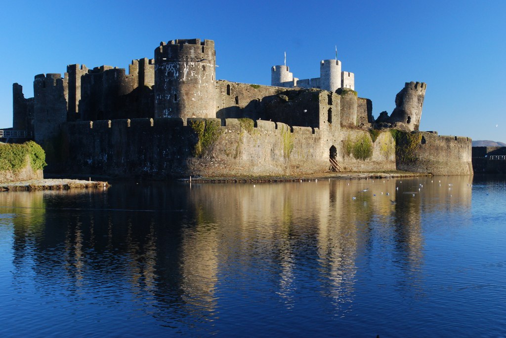 Caerphilly castle Visible on the right is the leaning towe… Flickr