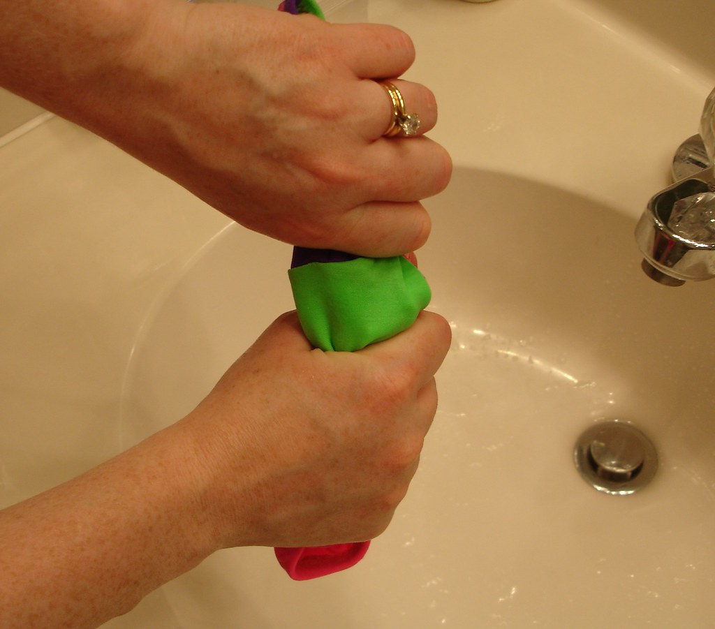 Squeeze Water from Suit Don't wring! Just squeeze to remov… Flickr