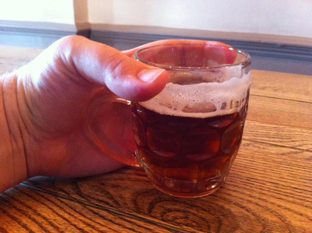 big hand or small glass? bob walker Flickr