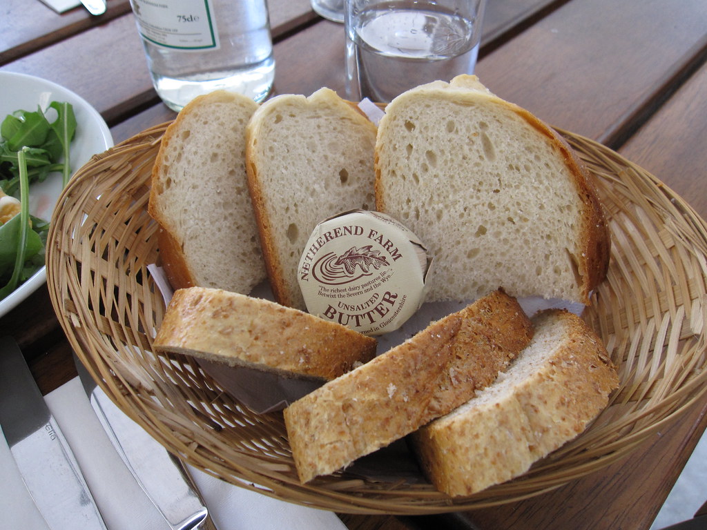 Bread & butter A basket with bread and butter at the Fish!… Flickr