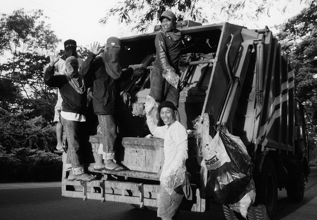 garbage truck crew, Philippines Mark W Brunner Flickr