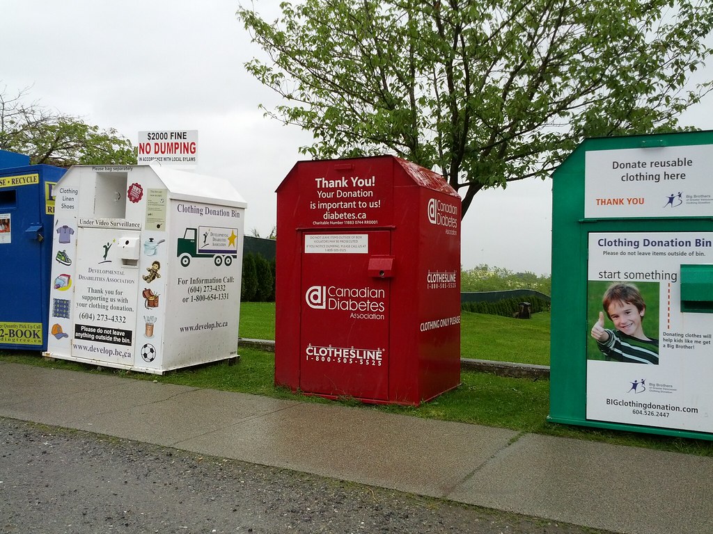 Clothing donation bins Raul PachecoVega Flickr