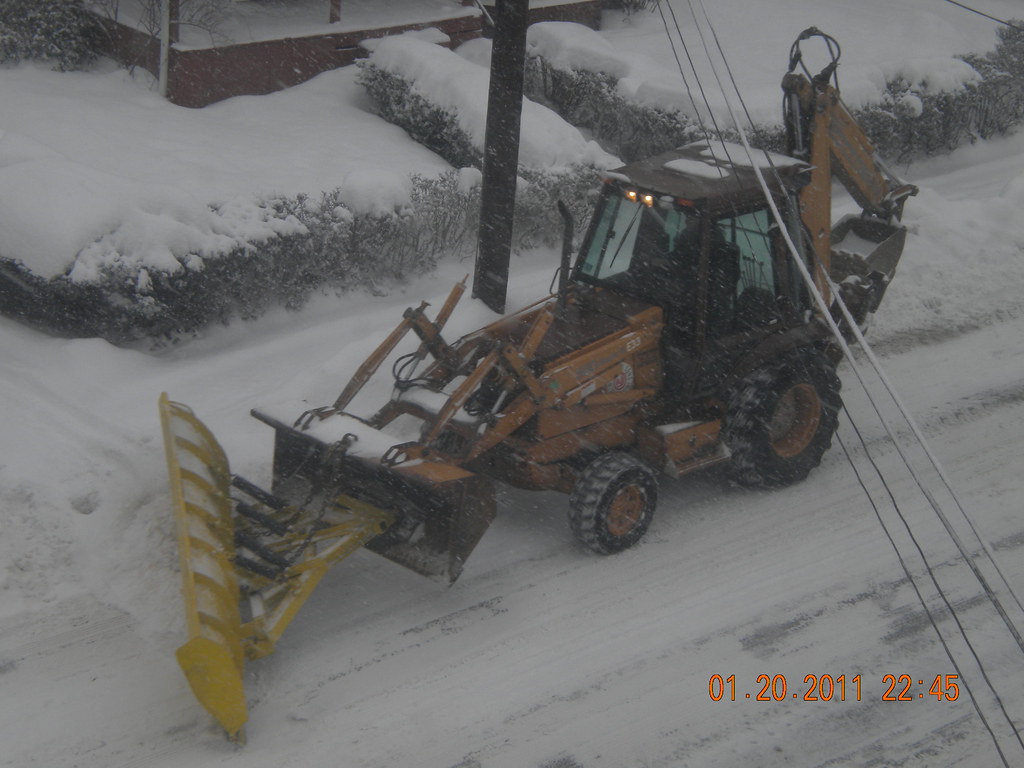 Snow Plow Case backhoe plowing snow. matredsoxfan Flickr