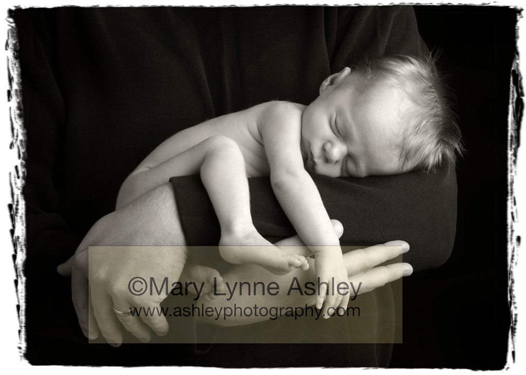 Newborn sleeping in arms See more of my baby and child pho… Flickr