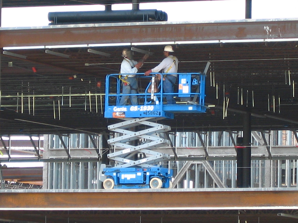 Scissor Lift Work crew on scissor lift, Houston, Texas Bill Jacobus