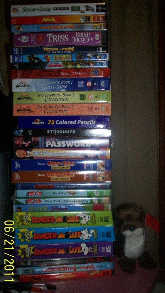 DVD stack, part 1 Most of the DVDs that I own. And a stray… Flickr