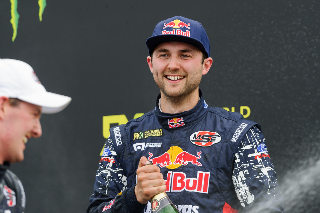 _TRX8295 Andrew Jordan (GBR) on the podium after securing … Flickr