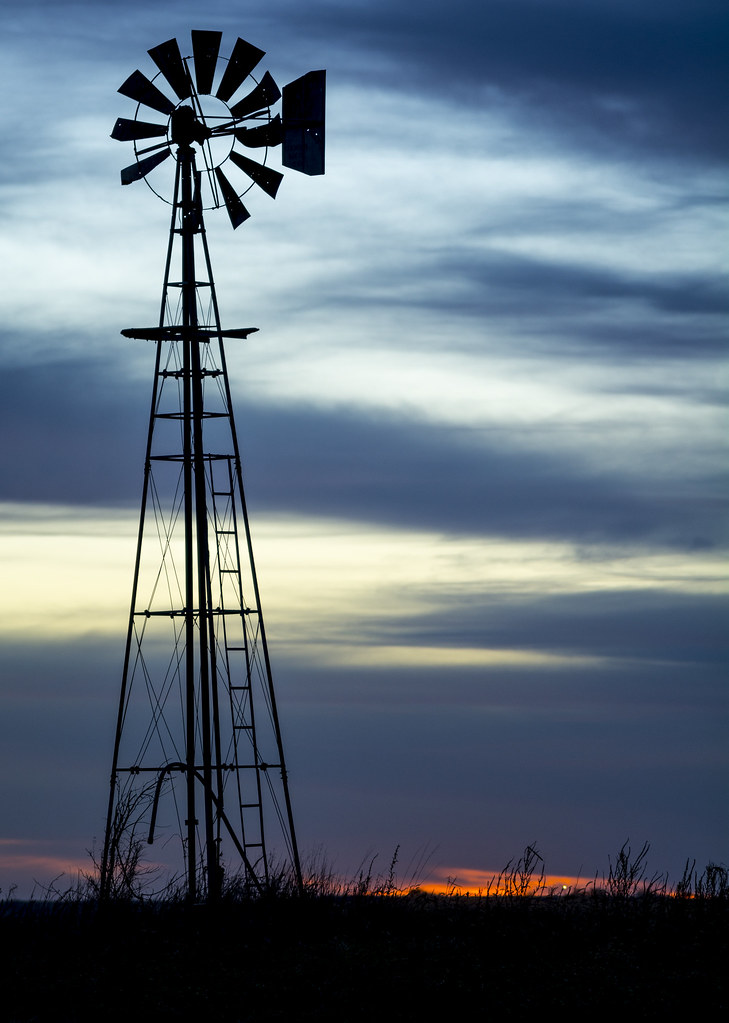 How deep can a windmill pump water from?