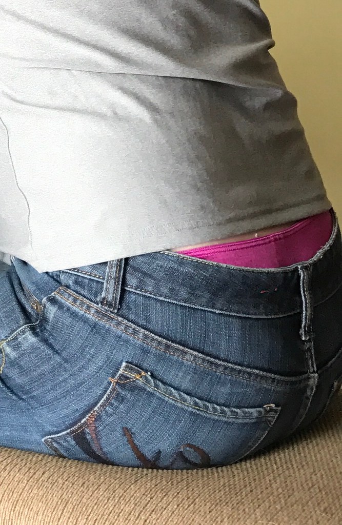 Downpants panty peek Pink panties peeking out of jeans. Allison