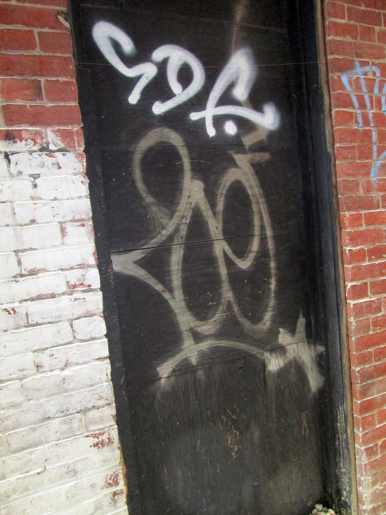 ZOE brookline street graffiti This photo is licensed under… Flickr