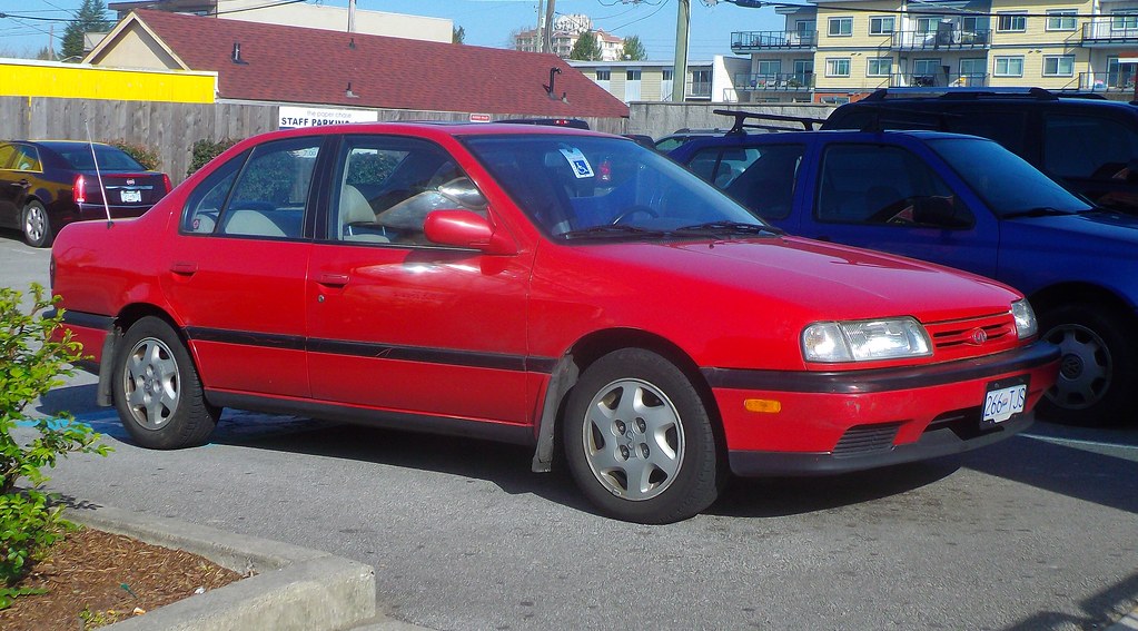 1992 Infiniti G20 | I like this one quite a bit being red ov… | Flickr