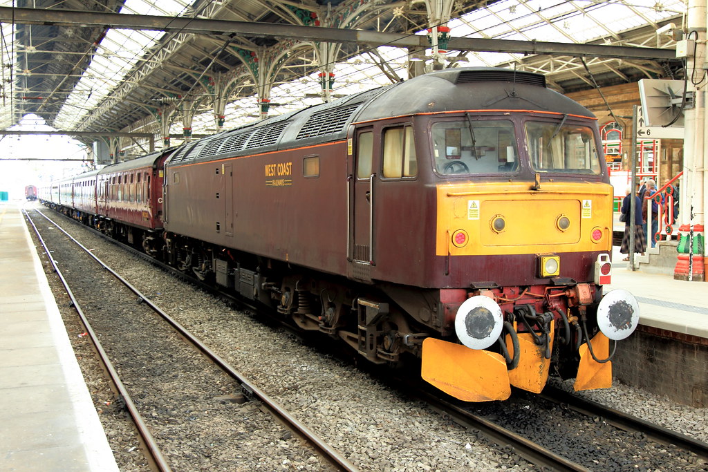 Roses Express Rear pushing Class 47 diesel sits waiting at… Flickr