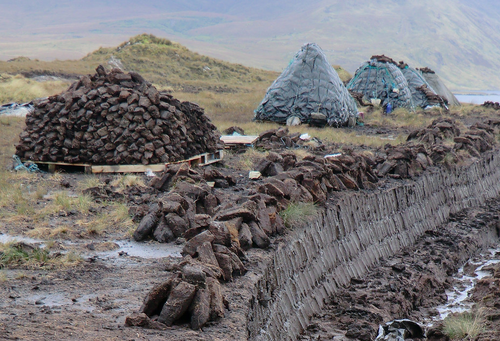 Harvesting the Peat Peat is still used as a fuel in the wi… Flickr