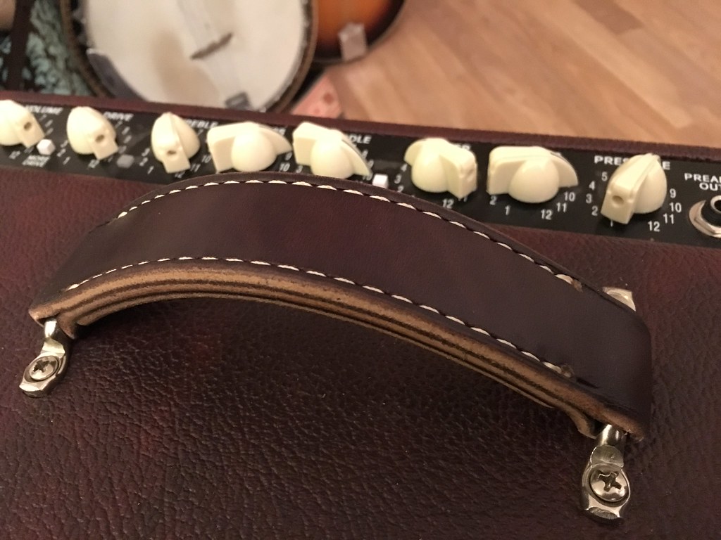 Putting a beautiful new leather strap on my amp, custom ma… Flickr