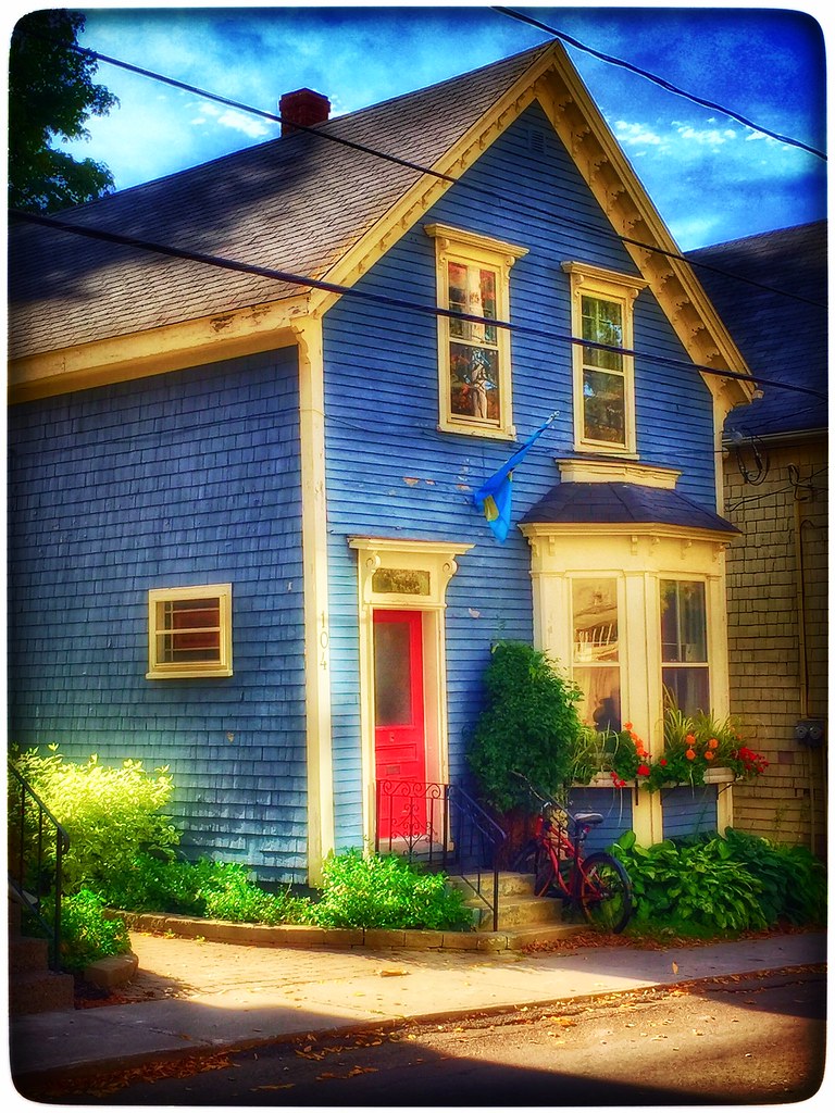 That little blue house... One of many quaint and picturesq… Flickr