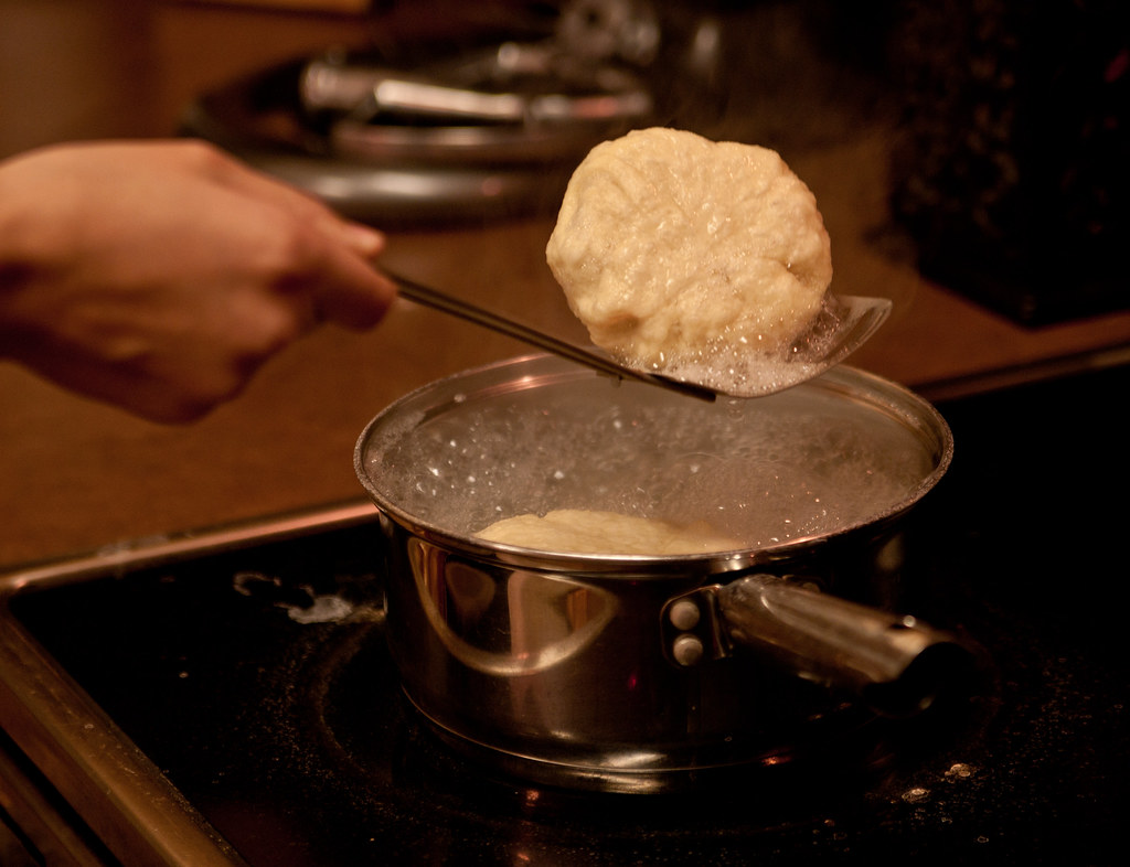 pretzel rolls coming out of the baking soda bath Mark Bonica Flickr