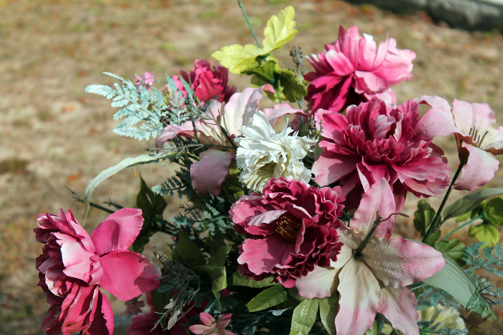 Fake Flowers A bouquet of fake flowers placed at a grave. Megan
