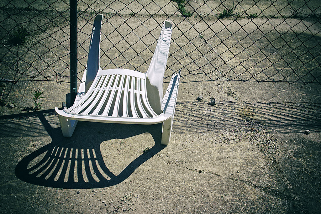 Plastic chair has fallen over. A plastic chair has fallen … Flickr