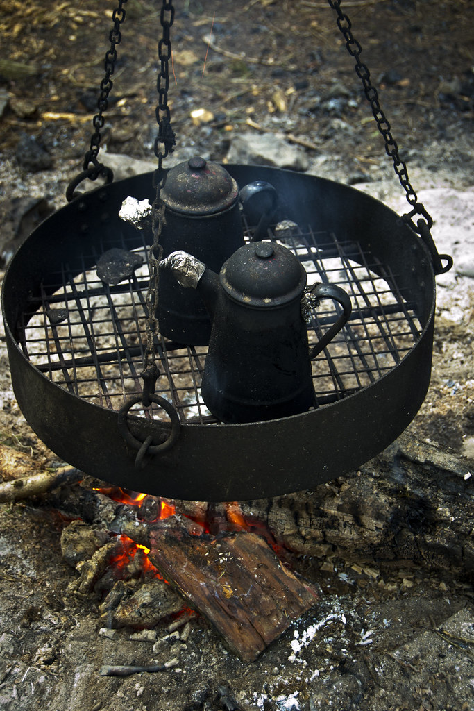 71 Kettle or Pot Two kettles over the open fire heating u… Flickr