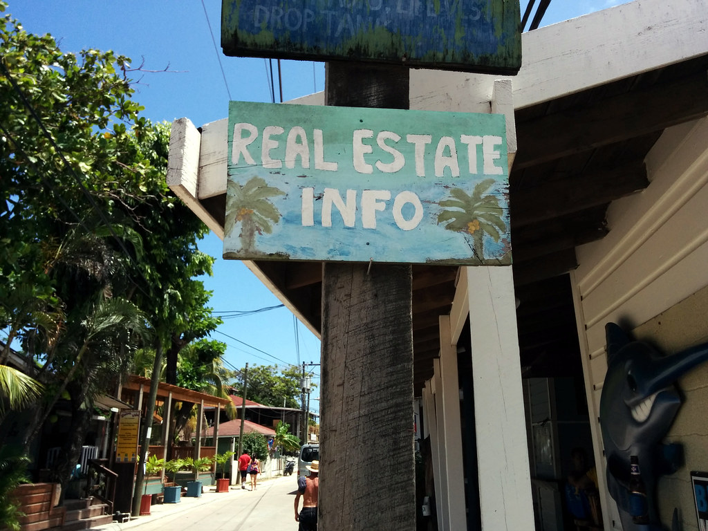 Real Estate Info sign, West End, Roatan, Honduras Cory Doctorow Flickr