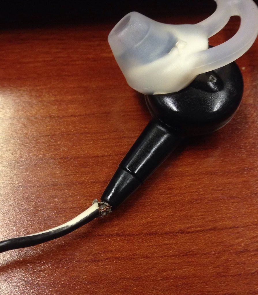 wire_exposed Bose inear headphone wire exposed after a ye… Flickr