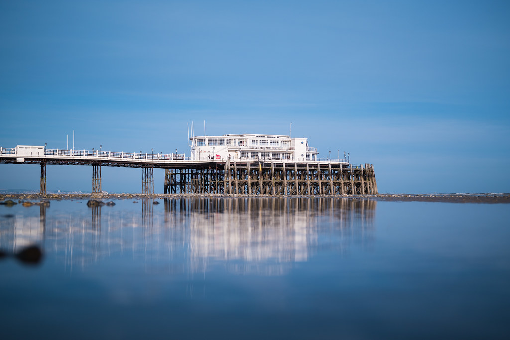 Worthing pier at low tide When the tide is low enough you … Flickr