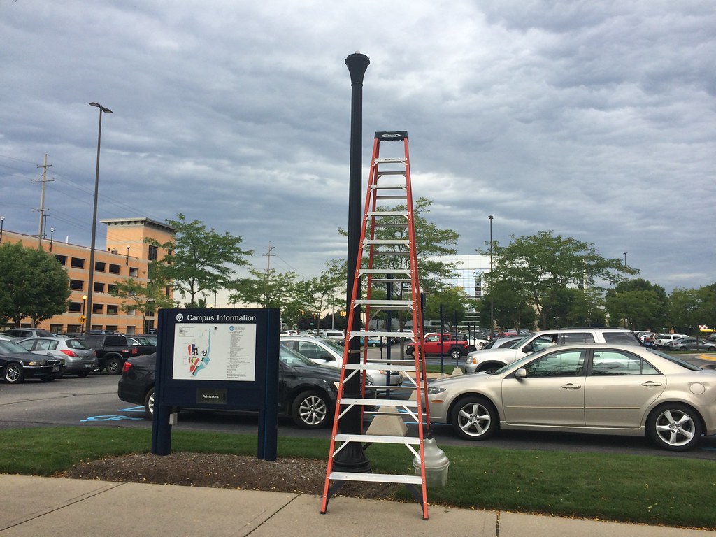 Ladder Fixing Street Light Grand Rapids Pew Campus Parking… Flickr