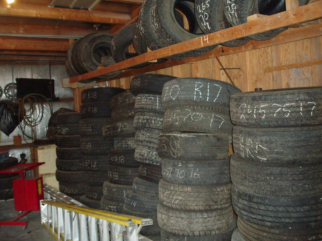 Bay one of body shop Used tires in bay one Anaconda Automotive Flickr