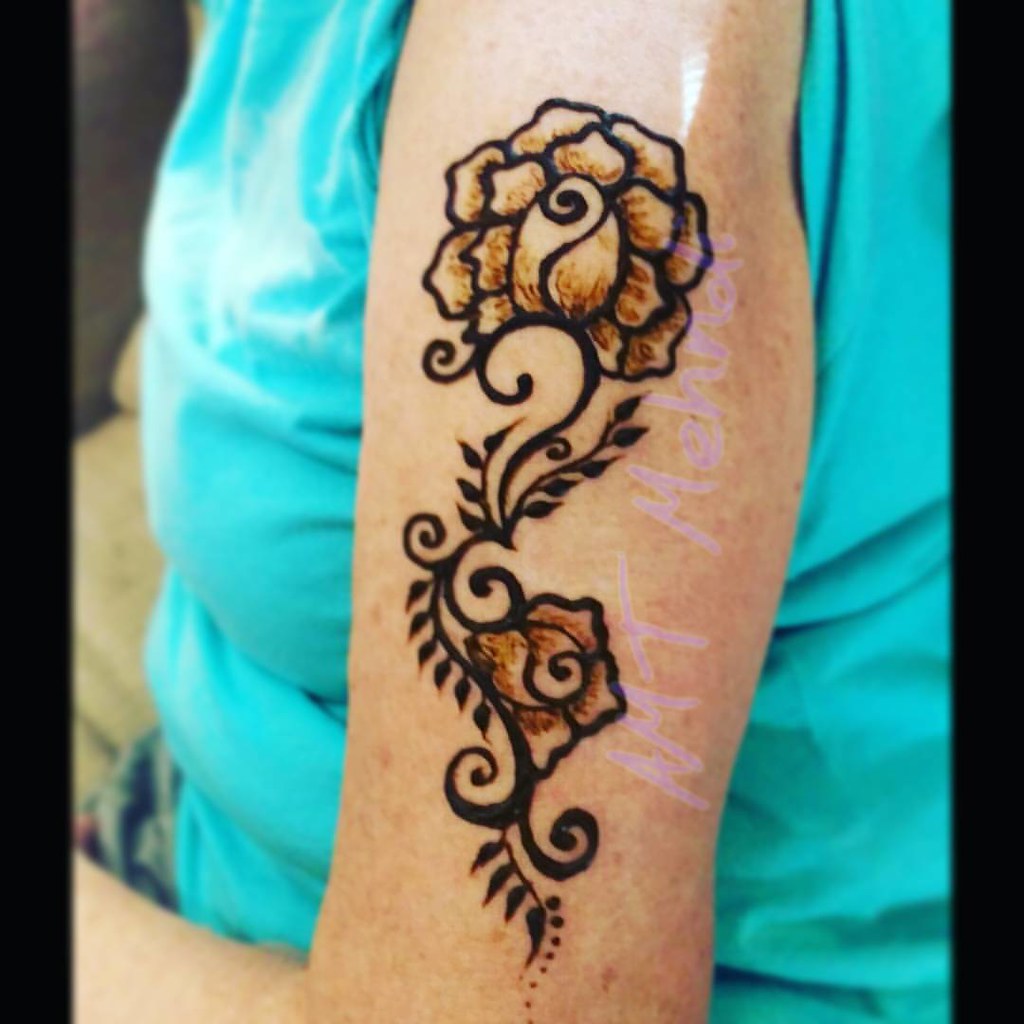 A simple arm design featuring a rose for a client that is… Flickr