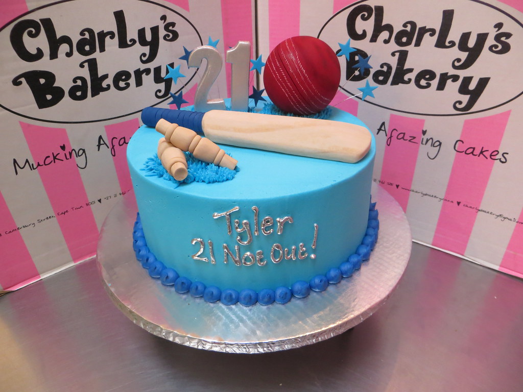 Cricket themed 21st birthday cake with 3D bat, ball and wi… Flickr