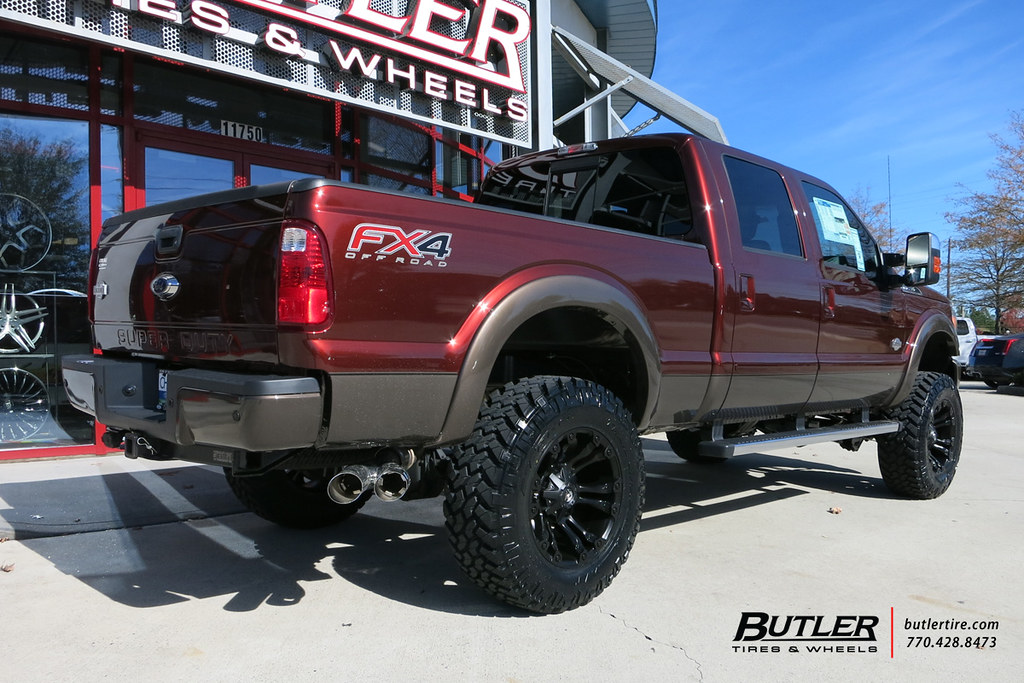 Ford F250 with 20in Fuel Vapor Wheels and Toyo OPMT Tires with 6in Pro Comp Lift Kit a photo