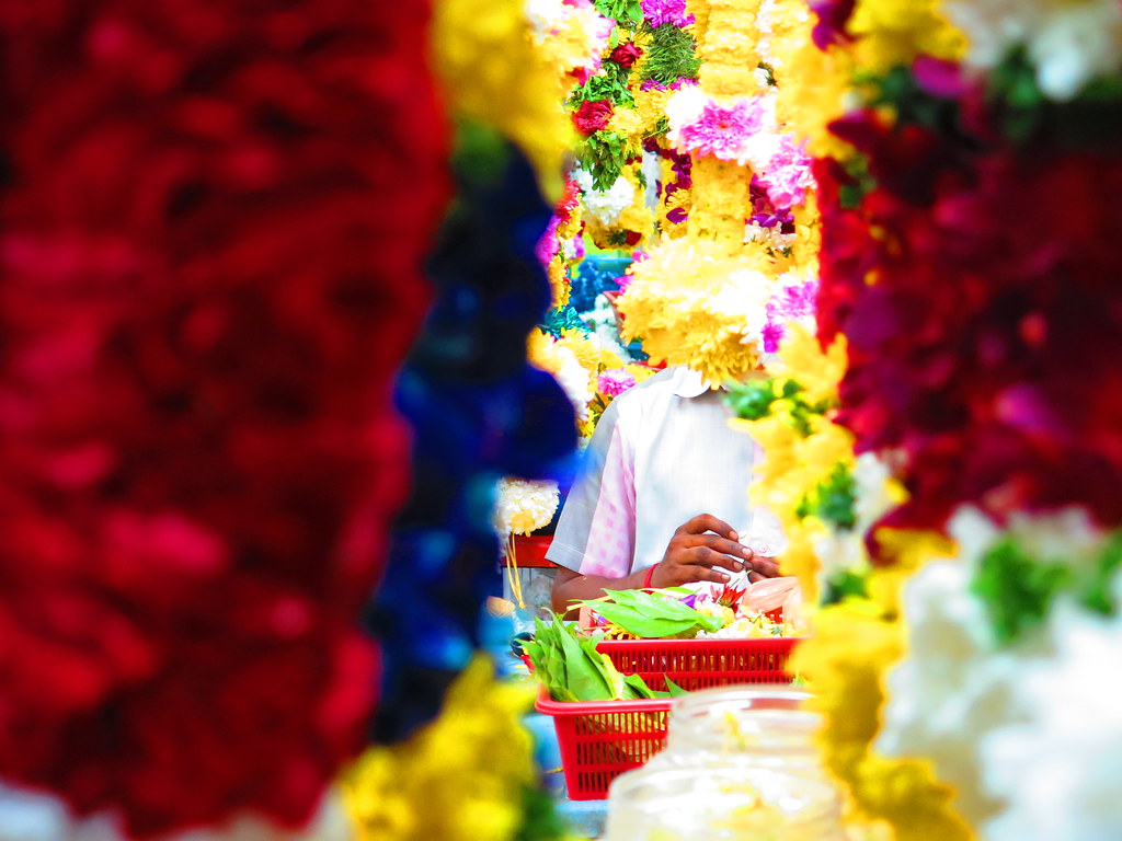 Busy At The Back A garland maker near a Hindu temple at Br… Flickr