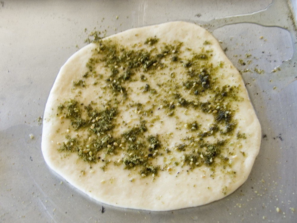 Gastrocast 69 Manaaeesh (Lebanese thyme bread) coated in … Flickr
