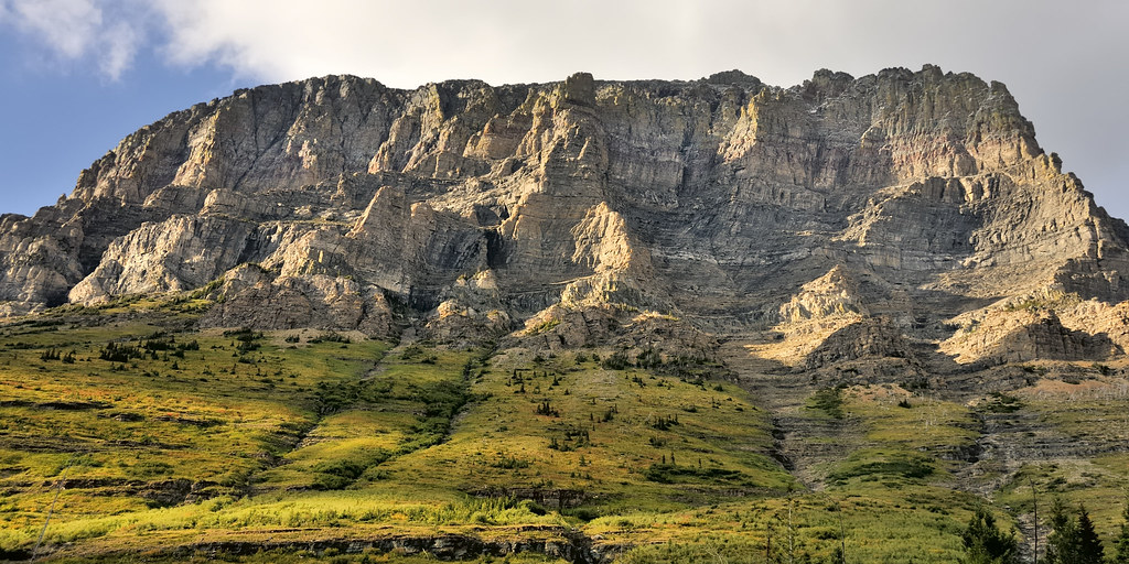 Mountain crag face at sunset Glacier National Park, East… Flickr
