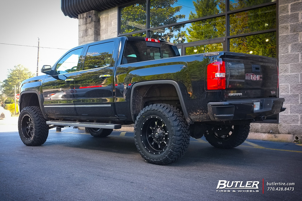 GMC Sierra 1500 with 20in Fuel Krank Wheels and Toto MT Tires with 6in