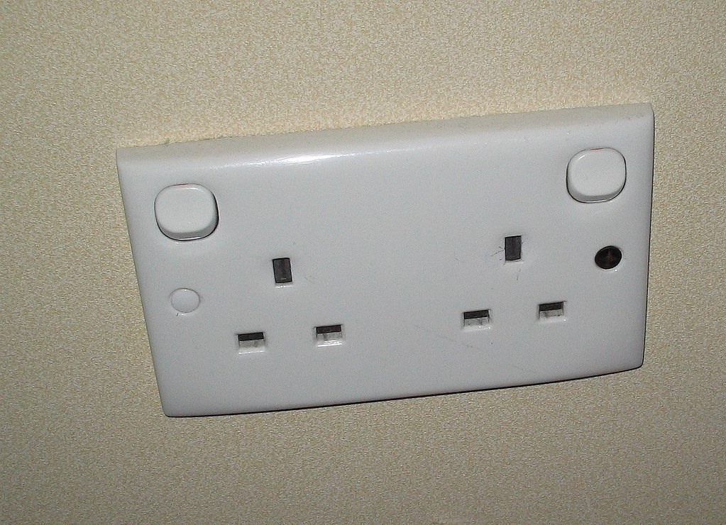 IMG_2494 UK plug sockets in the hotel room! Dan McNeil Flickr