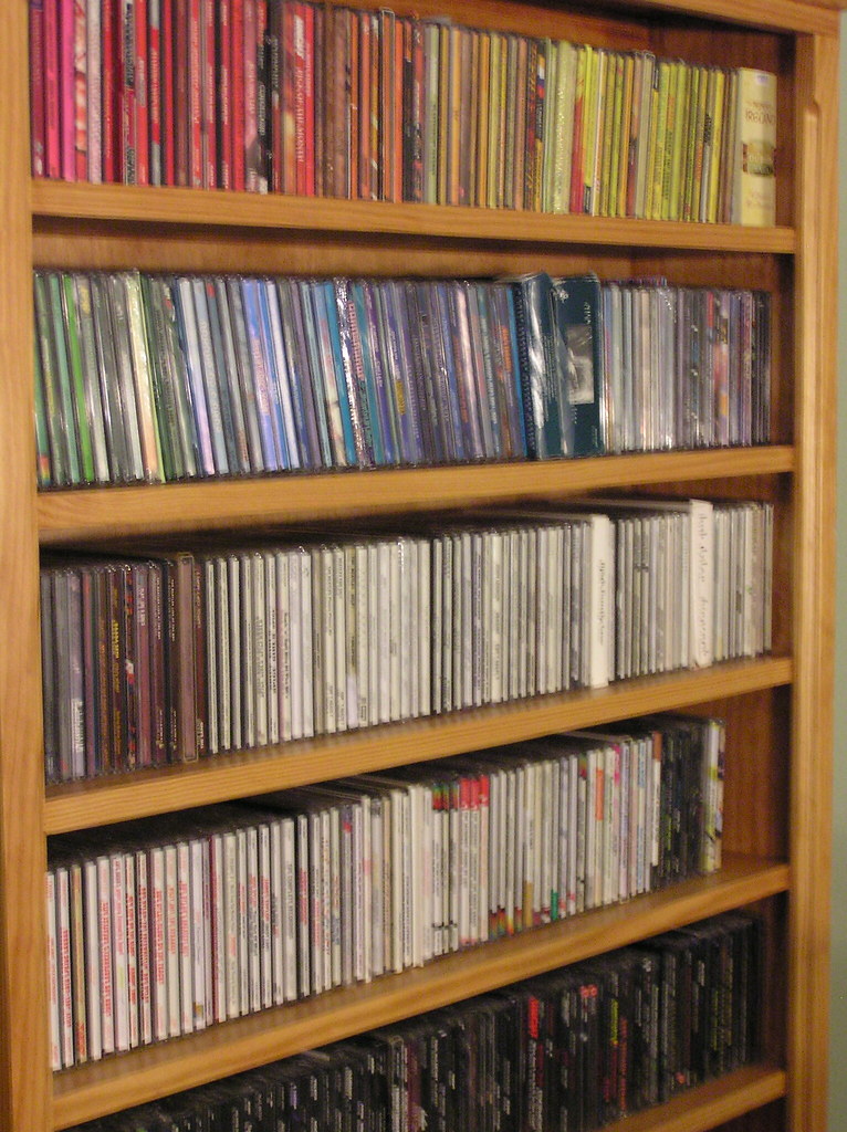CDs Organized by color I decided to organize my CDs not by… Flickr