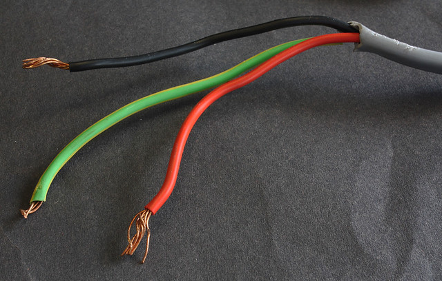 Electrical wiring colours, pre2004 IEE10062011. Red is live, black