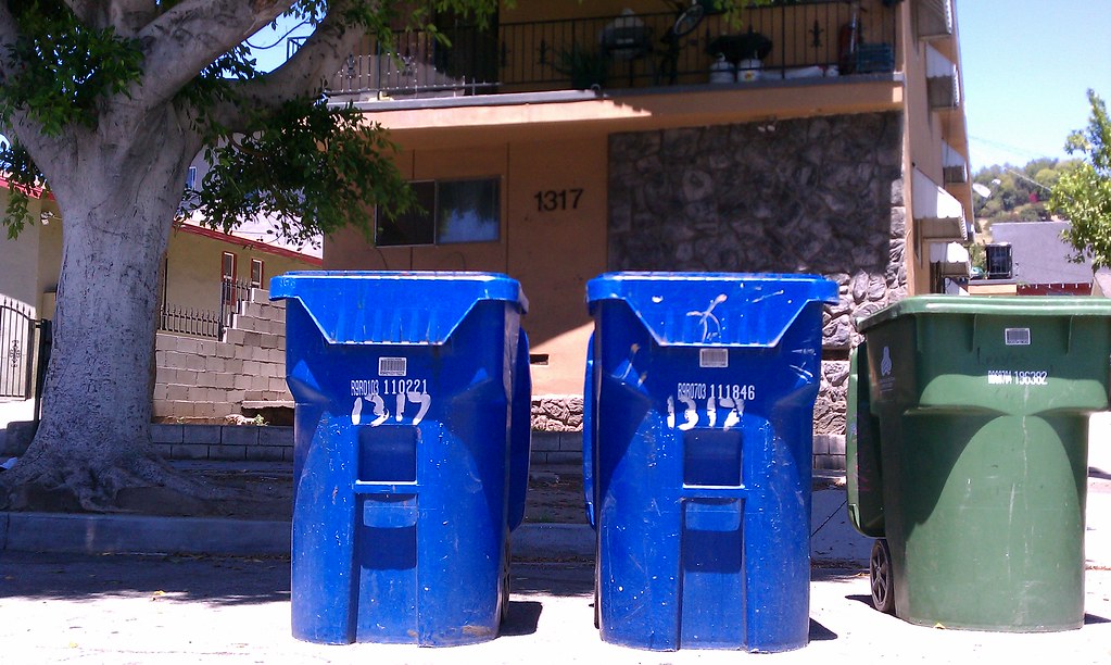 Trash cans blocking bike lane on Cypress Avenue in North E… Flickr