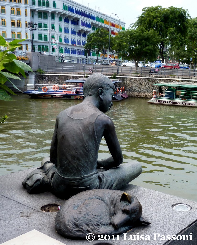 Statue of boy and dog, along the Singapore river LuisaLuisa Flickr