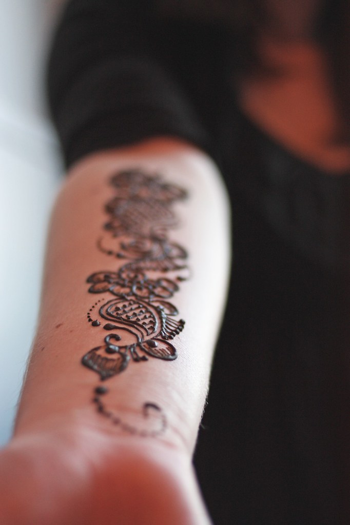 Henna tattoos at the Definition 6 party Read more about