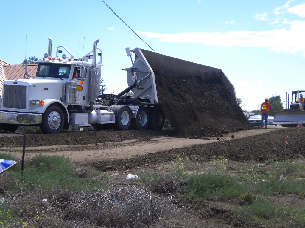 Side dump truck makes placing material easier City of Ellensburg Flickr