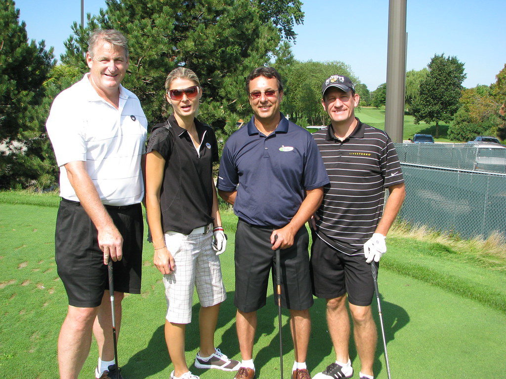 023 Titan Electric foursome Mike McInerney, Liz Guillen, … Flickr