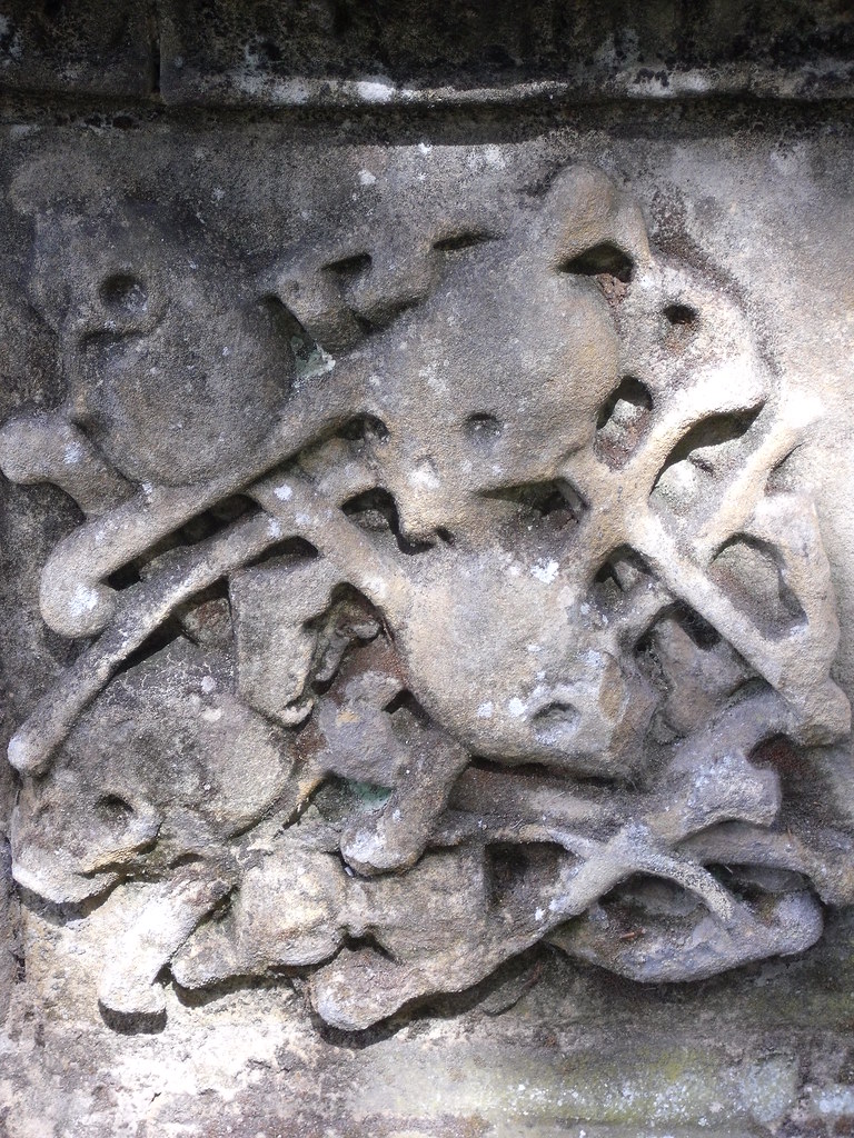 Jumble of bones Detail from a chest tomb in the churchyard… Flickr