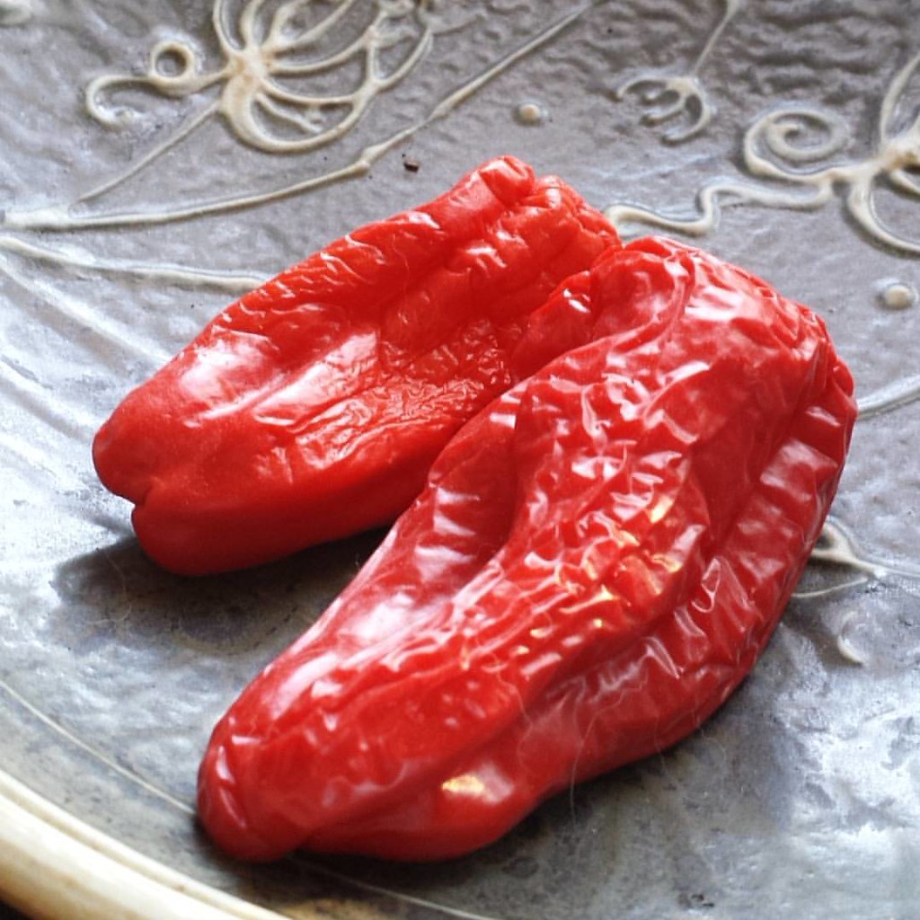 Yellow Gypsy Peppers that have turned red. And, ugh, dog h… Flickr