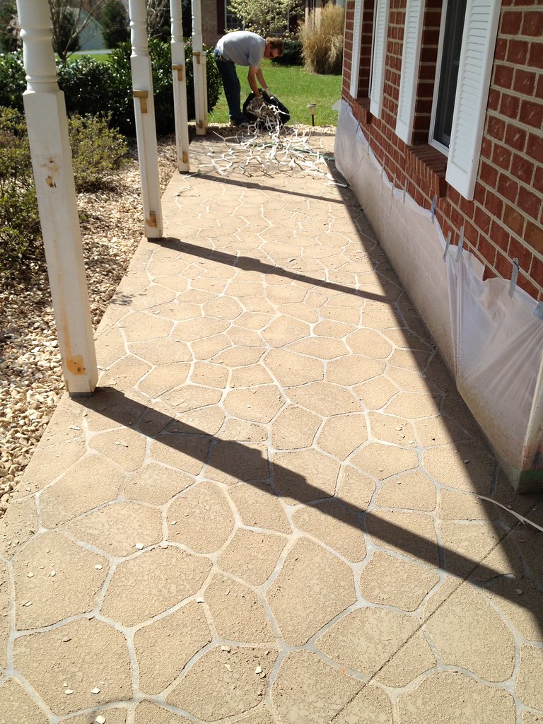 Applying a sprayed concrete overlay in Forest, VA Tim Seay Flickr