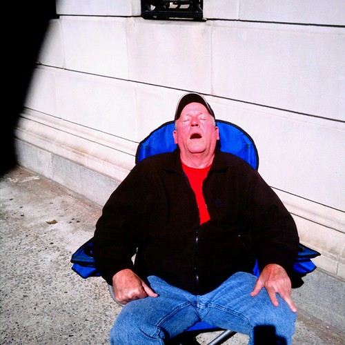 Man sleeping in chair Manhattan, NYC Timothy Krause Flickr